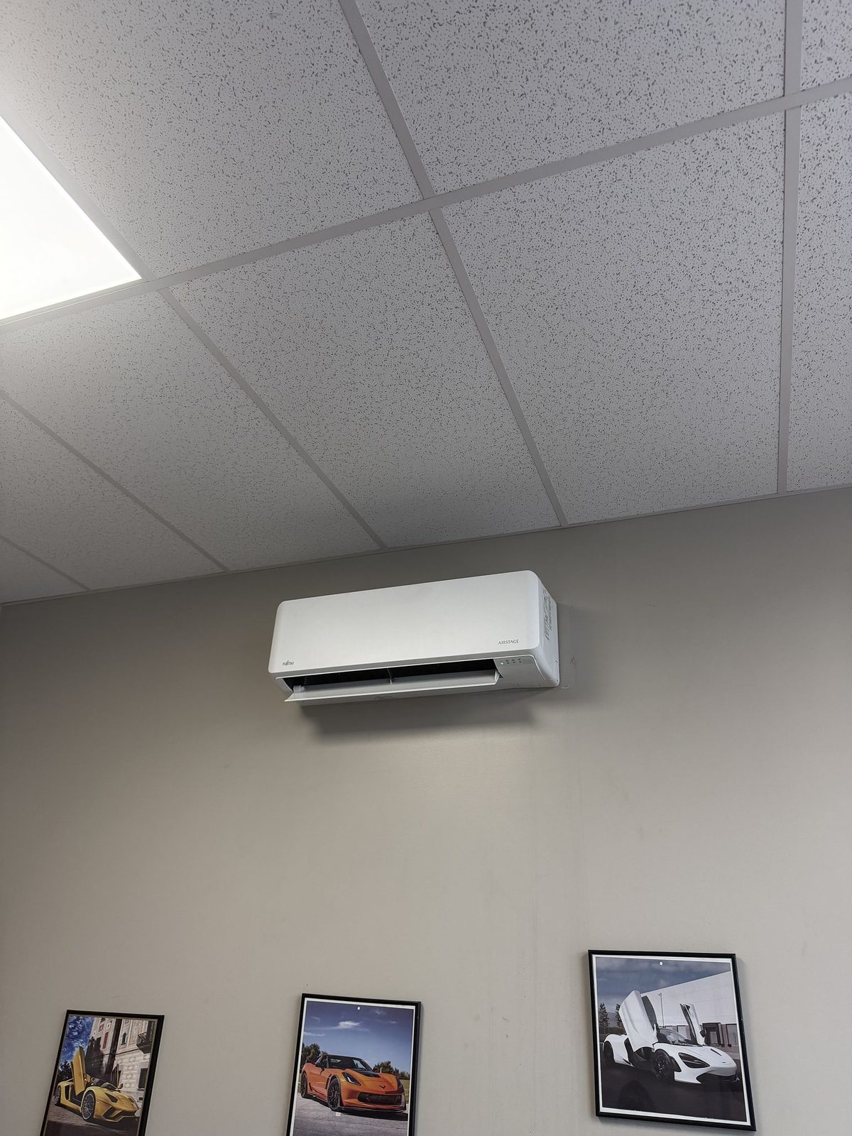 Wall-mounted Fujitsu mini split indoor head in the office
