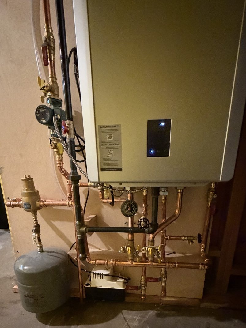 Rinnai combi boiler installed with new copper piping, circulator and expansion tank