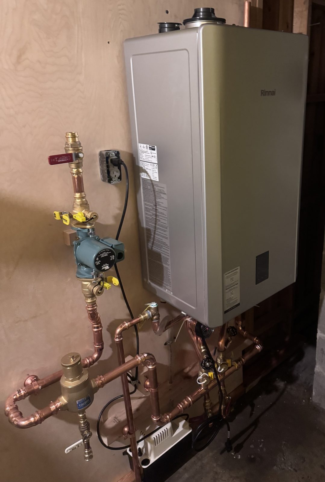 Angled view of Rinnai I-Series combi boiler installed by A.W. Crooks